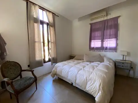 VENTA: Casa de dos dormitorios con cochera, jardín y amenities en Tierra de Sueños 2, Roldán