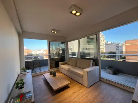 Venta - Departamento dos dormitorios y terraza exclusiva. Centro, Rosario.