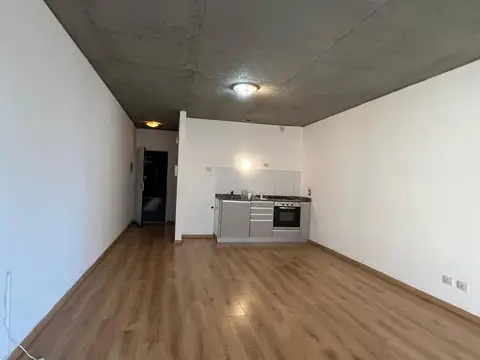 Monoambiente con balcón y cochera