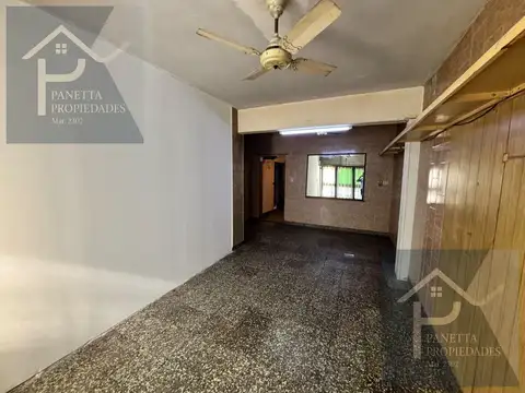Casa de un dormitorio y cochera