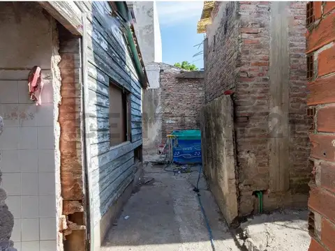 VENTA LOTE CON VIVIENDA