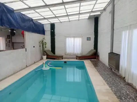 EN VENTA: Exclusiva Propiedad con Quincho y Pileta Climatizada en Mapu Ngefu, Puerto Madryn