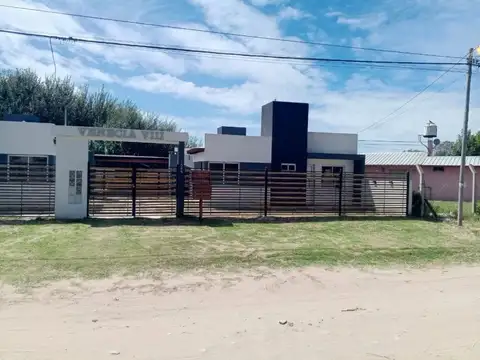 CASA A ESTRENAR CON 2 DORMITORIOS + PATIO + PARRILLA + COCHERA
