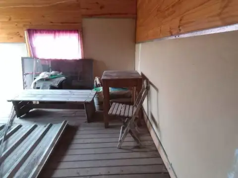 TERRENO EN LOS PIONEROS CON CONSTRUCCION A TERMINAR