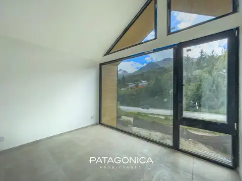 VENTA departamento 3 ambientes con cochera y jardin