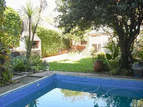 Venta casa Fisherton, Rosario 2 dormitorios con jardín y pileta. acepta permuta