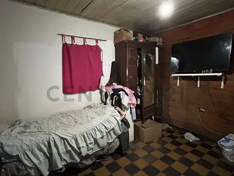 Venta de lote con casa a refaccionar