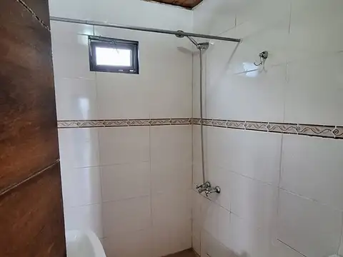 VENTA LOTE CON CASA INDUSTRIALIZADA,GUAYMALLEN