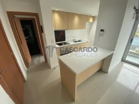 Departamento de 2 ambientes con balcón y cochera cubierta