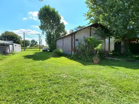 CASA Y TERRENO SOBRE RUTA 11 N° 8125 - SAUCE VIEJO