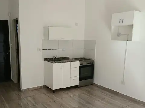 Departamento Monoambiente con patio y cochera