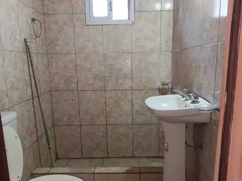 Depto dos ambientes en planta alta.