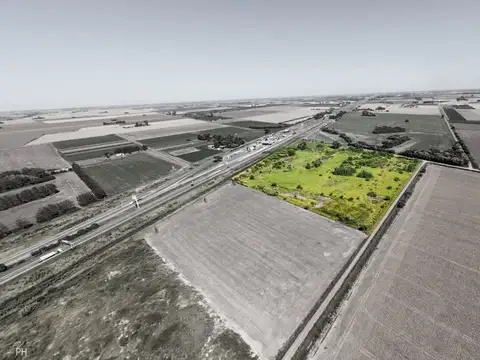 CAMPO 7HA EN VENTA SOBRE AUTOPISTA ROS-BUE