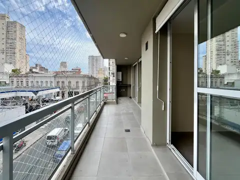 Departamento de dos dormitorios, cochera y amenities en alquiler