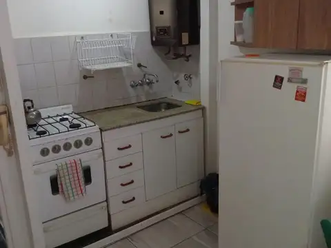 Luminoso ambiente en piso alto con Terraza