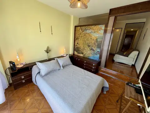 Generoso ambiente al frente 