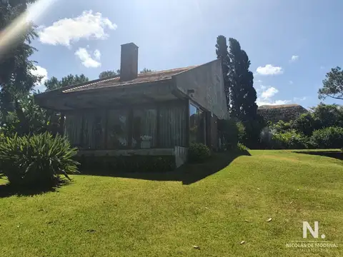 Espectacular casa con jardín a la venta