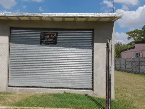 VENDO AMPLIO LOTE CON LOCAL