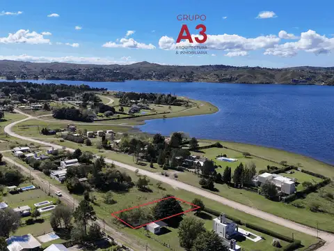 LOTE SOBRE AV COSTANERA EN POTRERO DE GARAY FRENTE AL LAGO-875