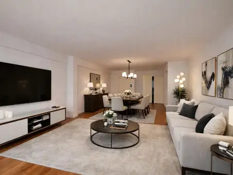 VENTA: Piso exclusivo de 2 dormitorios, vista lateral al río, dos baños en suite, balcón. Cochera.
