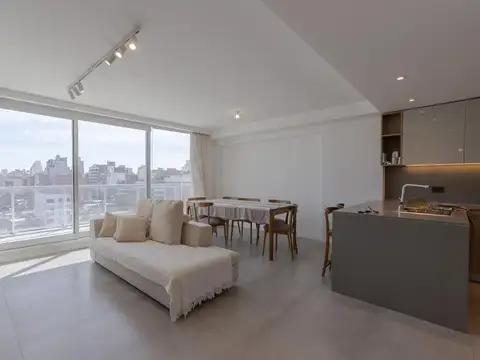 VENTA - DEPARTAMENTO DOS DORMITORIOS CON COCHERA Y BALCON ATERRAZADO - CENTRO RIO