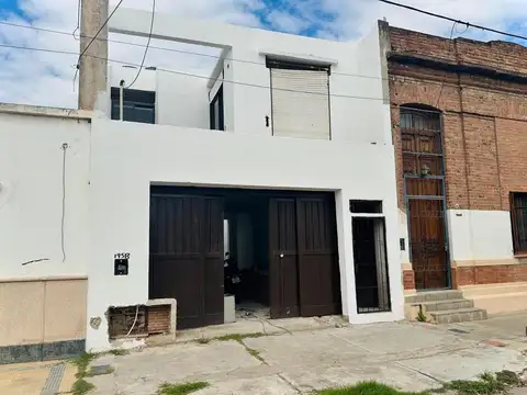 Salón comercial + departamento con terraza y balcón en San Jerónimo