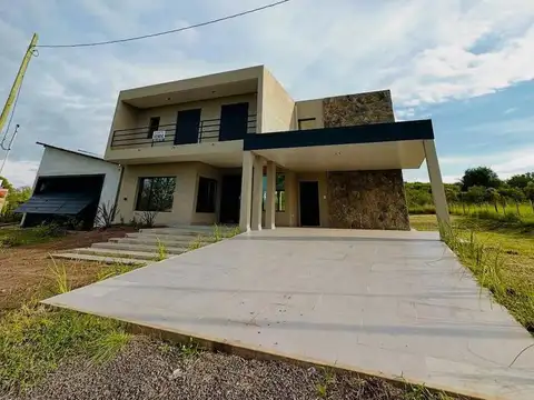 Playa grande, Villa del dique