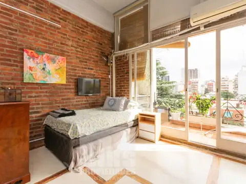 Diseño y Funcionalidad en un Solo Lugar: Loft con Cochera Adaptable a Oficina Moderna