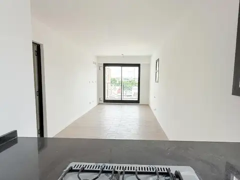 DEPARTAMENTO DE DOS DORMITORIOS VENTA QUINCHO Y PARRILLERO ABASTO ROSARIO