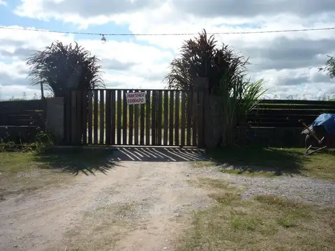 Av. Arturo Illia y acceso privado. Villa Los Álamos