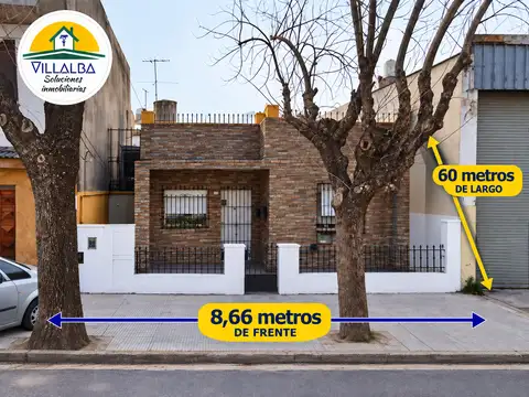 CASA SOBRE GRAN LOTE 8,66 X 60 MTS CON DOS DEPARTAMENTOS, FONDO LIBRE Y SALIDA A DOS CALLES