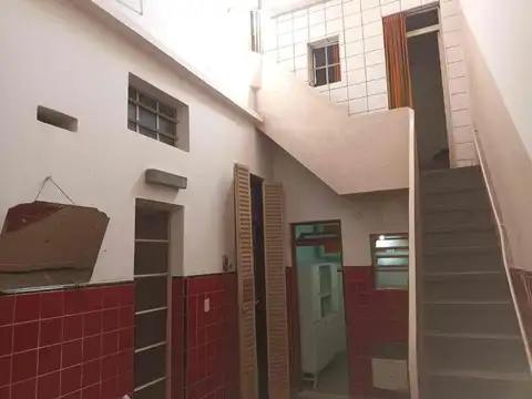 Local y vivienda de 2 plantas en lote propio