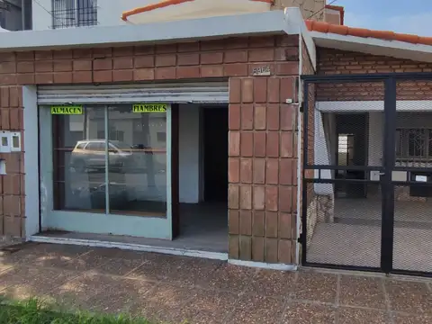 Casa con local y garaje