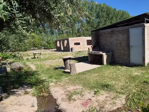 Venta Terreno con casa en obra y galpón - Perdriel