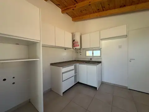 Venta - Casa a estrenar de dos dormitorios con jardín, galería y cochera en Pueblo Esther