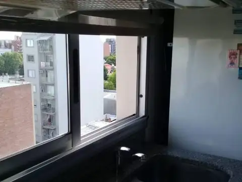 DEPARTAMENTO DOS AMBIENTES CON COCHERA CUBIERTA