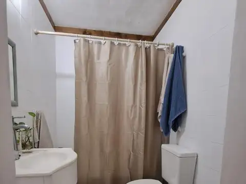 CASA CON PATIO Y COCHERA PUERTA 4