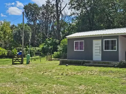 Premier Bienes Raíces vende 2 cabañas en Río Ceballos