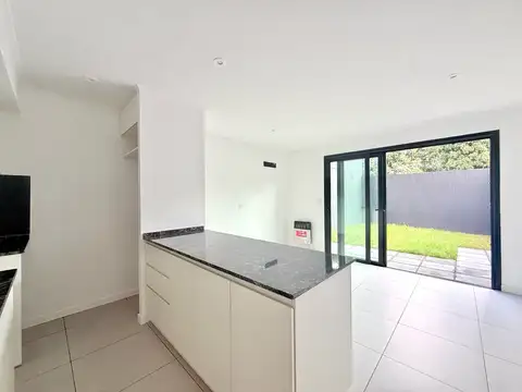 Departamento a estrenar 3 ambientes en venta en lujan planta baja con patio y cochera