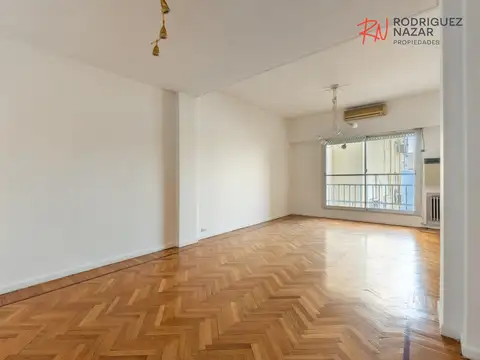 Venta de departamento de 4 ambientes con cochera en Palermo.