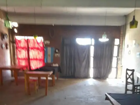 Terreno con mejoras