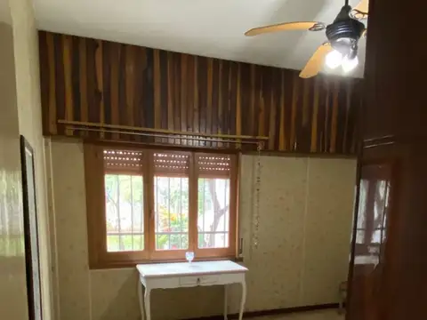 4 ambientes con cochera y fondo libre .