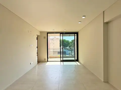 MODERNO DEPARTAMENTO DE DISEÑO CON COCHERA