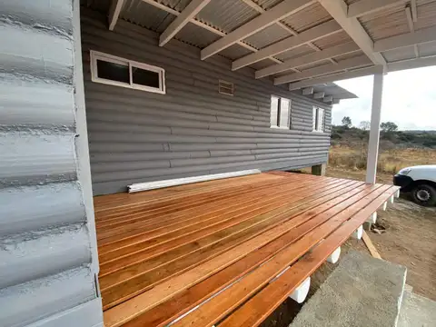 VENTA CASA 2 DORM CON COCHERA FINANCIADO LA FALDA
