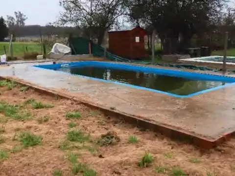 Venta Lote con Casa en construcción y pileta en Cañuelas