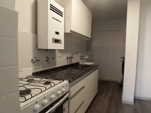 DEPARTAMENTO DOS DORMITORIOS, COCHERA, IMPECABLE, AIRE ACONDICIONADO, 150 METROS MONUMENTO