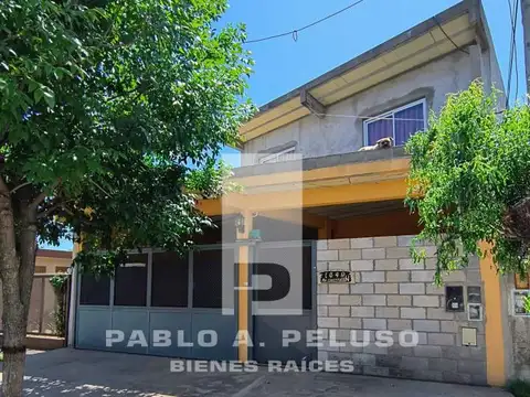 VENTA AMPLIO LOCAL USO INDUSTRIAL Y DOS DEPARTAMENTOS. MERLO. ZONA OESTE. BUENOS AIRES