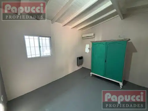Casa multifamiliar con 3 viviendas
