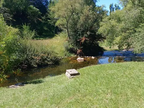 VENTA CASA FRENTE AL RIO POTRERO DE GARAY