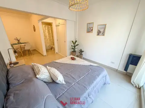 1 AMBIENTE A LA CALLE. CENTRO.